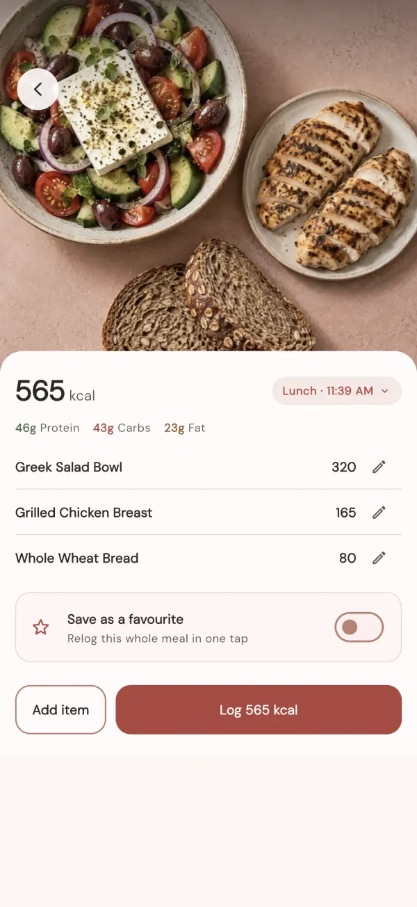 A meal photo counted by VitaCal at 565 kcal, with each food listed